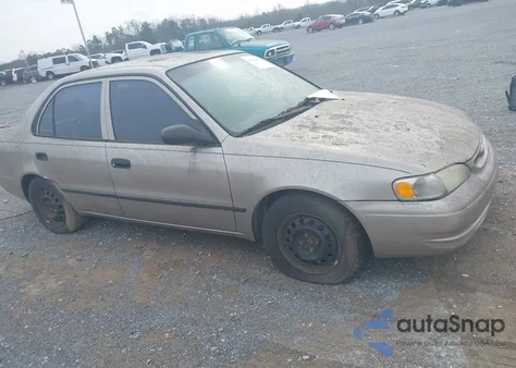 1999 Toyota Corolla Ce z USA, uszkodzony, nr VIN 2T1BR12E3XC221038